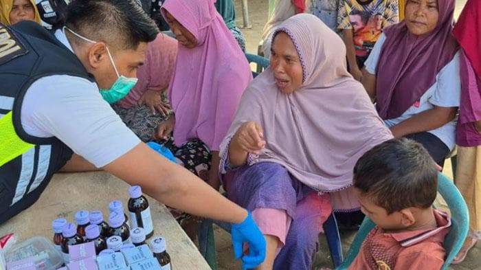 Seratusan Pengungsi Diserang Penyakit, Polres Lhokseumawe Gelar Pengobatan Gratis