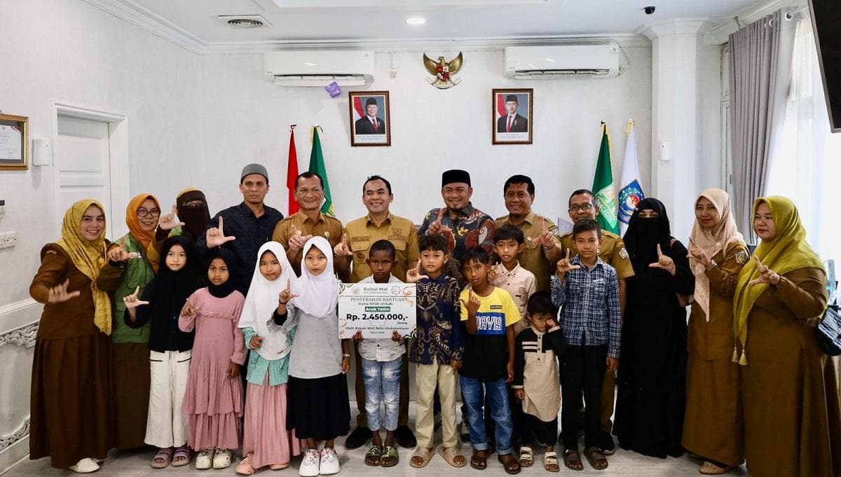 204 Anak Yatim Asuhan Wali Kota Lhokseumawe Terima Bantuan Uang dari Baitul Mal
